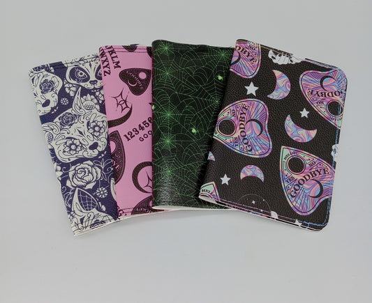 passport holders (creepy cute)