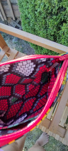 red ankara Clematis wristlet