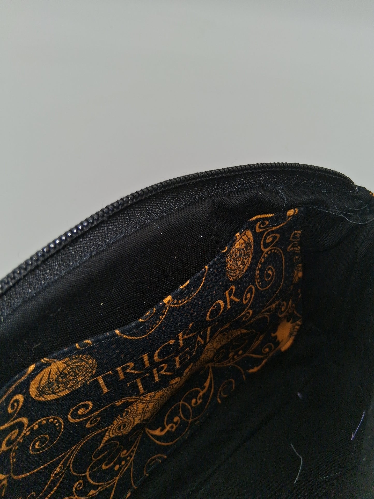 gold glitter tot v. 1 Clematis wristlet