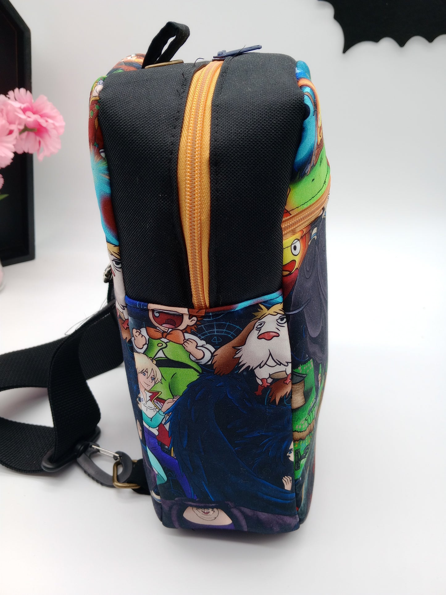 bacon and castle scenes Lotus sling backpack