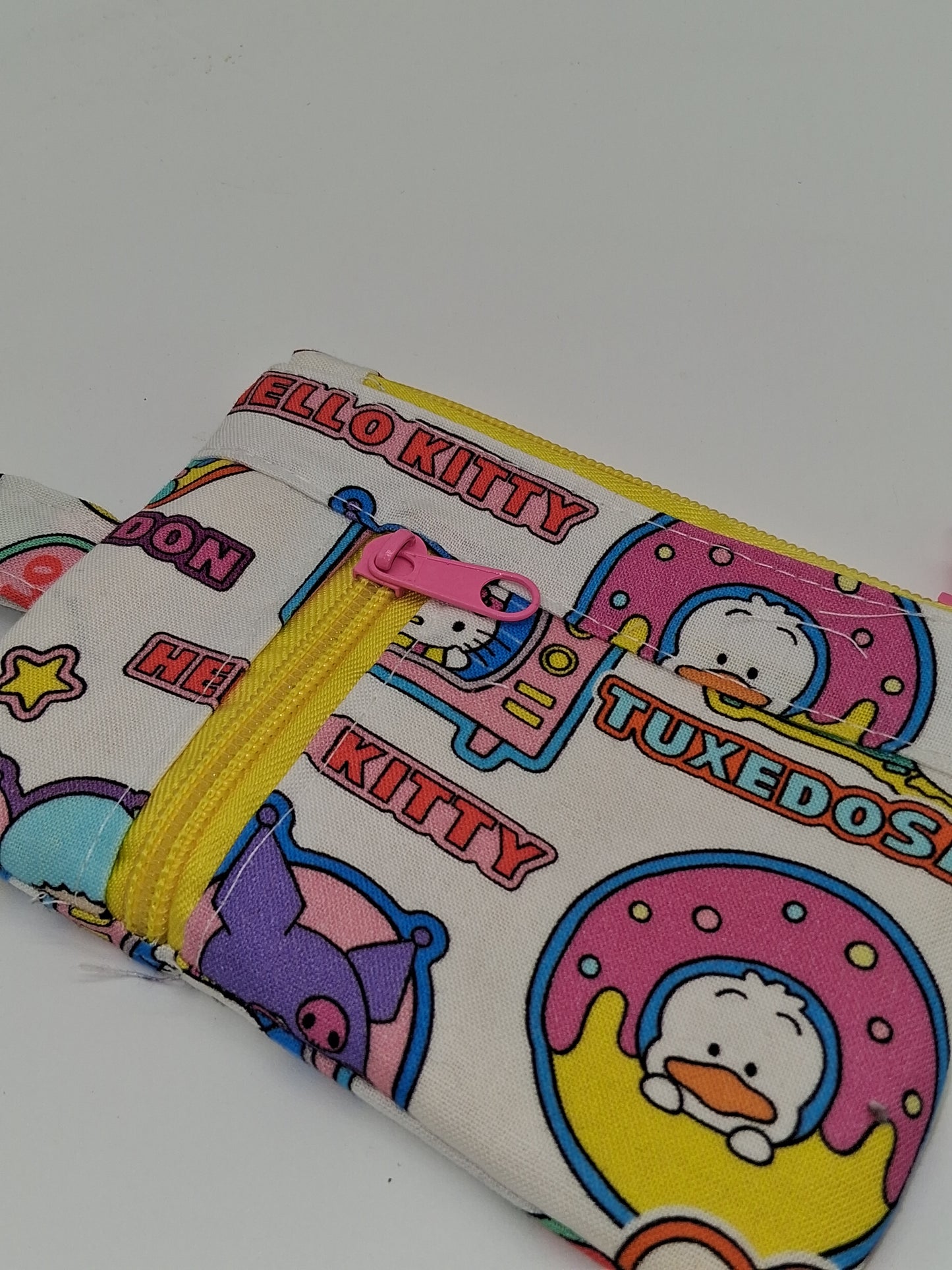 hello stickers v. 1 mini zippy clutch