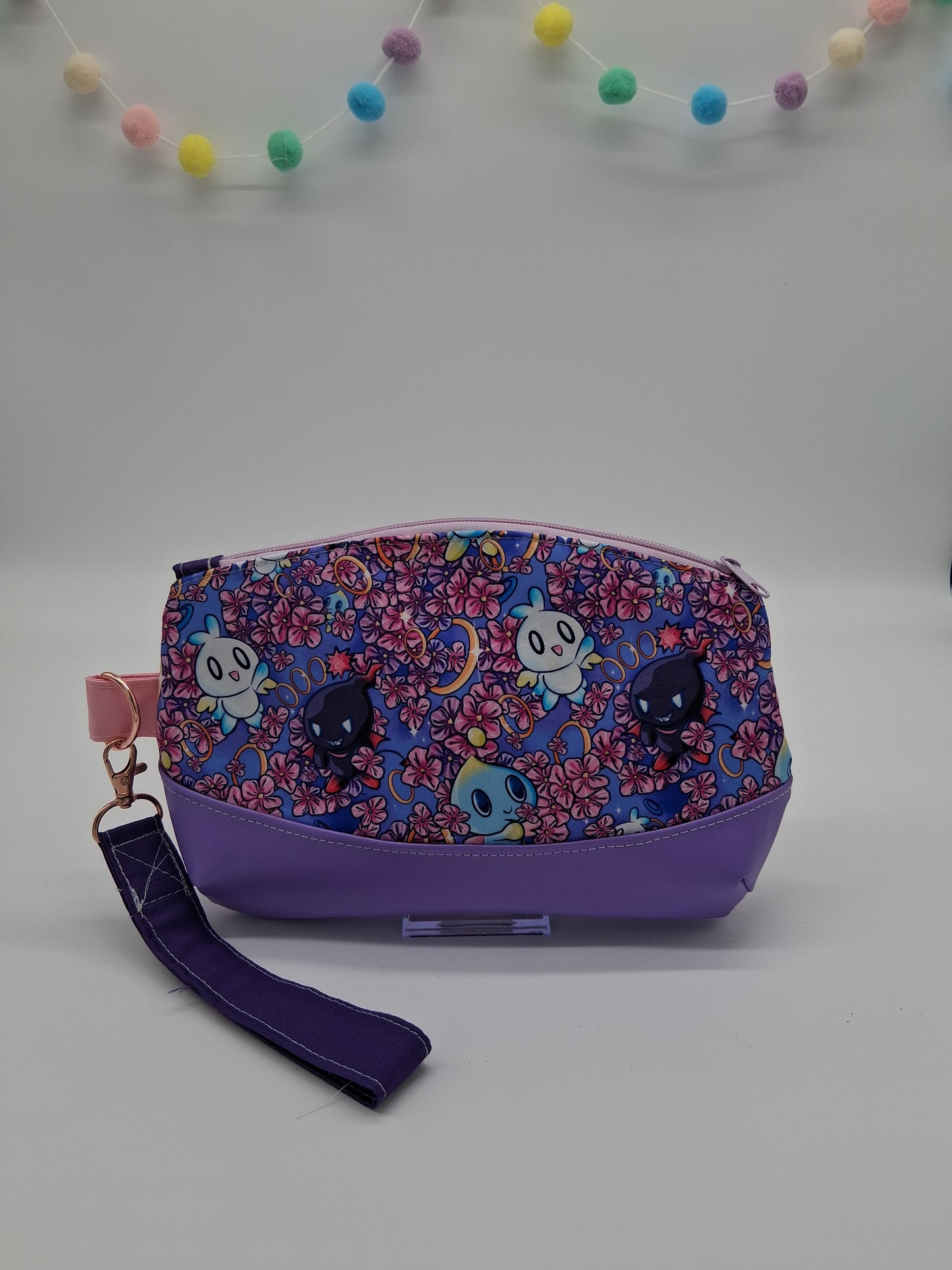 chaos buddies v. 2 Clematis wristlet
