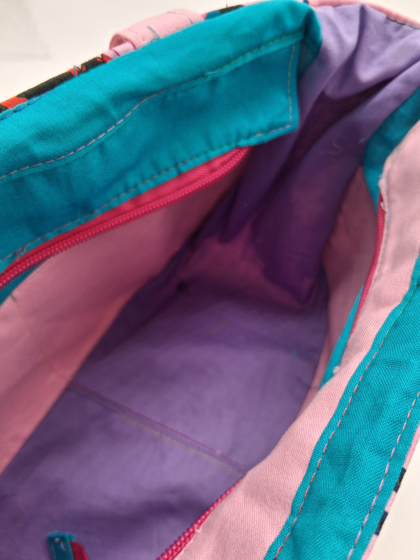 costumed pink guy Peony shoulder bag