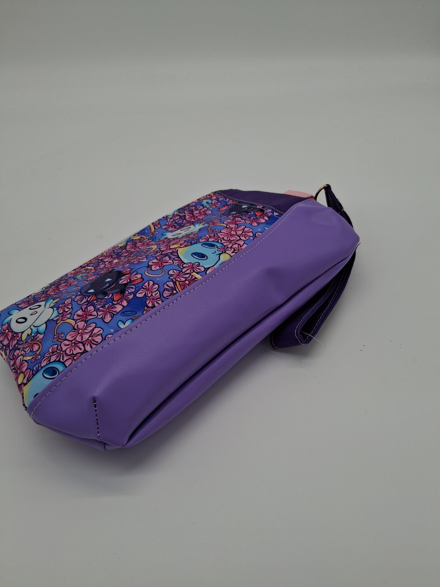 chaos buddies v. 2 Clematis wristlet